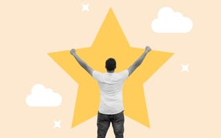 A man holds his hands up in the air with a big yellow star above him.