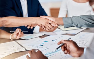Two businesspeople shake hands.