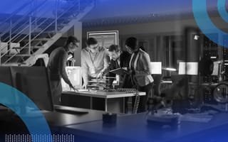 An engineering team works together on a project