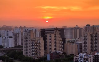 The sun rises on the Gurgaon skyline.