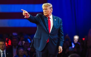 President Donald Trump points at a supporter during the Conservative Political Action Conference in February 2024.