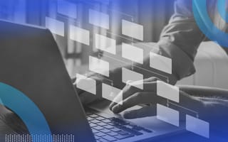 Data scientist working on laptop with binary tree overlay