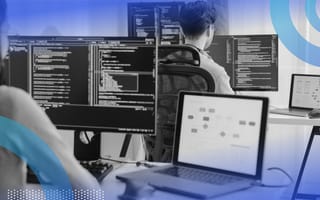 Two developers coding in javascript on computers