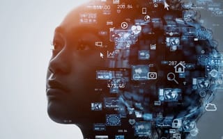 A person looking off into the distance with icons for AI concepts surrounding their head.