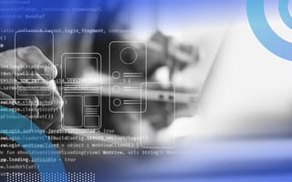 An overlay of an app design and code on a closeup of a developer working on a laptop