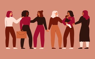 An illustration of women from different backgrounds holding hands and touching each other’s shoulders, symbolizing women supporting each other
