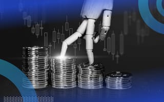 Stacks of gold coins in decreasing size with a robot hand on top