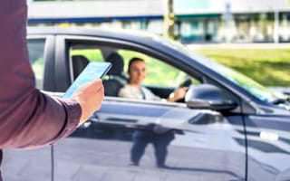 Person odering a ride share.