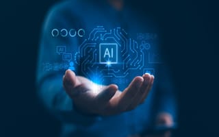 An illustration featuring the letters AI hovers over a person's open palm.