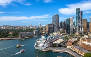 A photo of Sydney's skyline is shown.