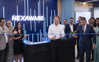 Hexaware leaders cut the ribbon to the company’s new London office.