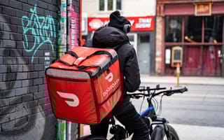 A doordash courier is pictured.