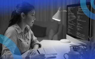 Developer reviewing code on computer