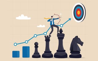 Illustration of a businessman walking up a line of giant chess pieces while pointing a bow and arrow toward a target, symbolizing the idea of using the right strategies to reach goals.