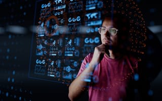 An image of a man looking at data is shown.