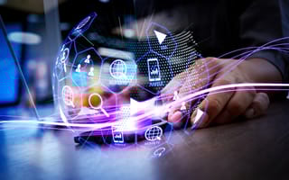 An image of a hand and various digital images is shown.