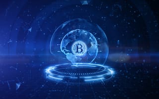 Futuristic digital image of a glowing Bitcoin symbol over a blue lit globe, surrounded by abstract data points and network elements.