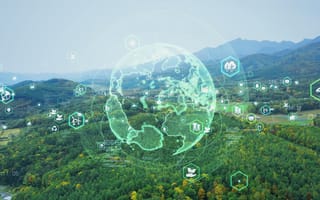 Aerial view of lush green forest with superimposed digital icons representing sustainability.