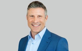 A headshot of Todd Surdey is shown.