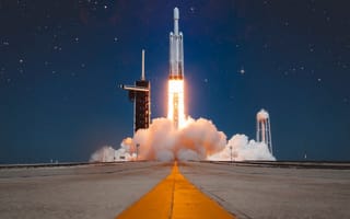 SpaceX’s Falcon Heavy rocket launching into space.