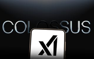 Image of phone with "xAI" on a blank white screen, along with the word "Colossus" in the background.