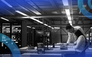 Cybersecurity analysts working in a data warehouse
