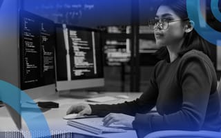 Cybersecurity professional working on a computer