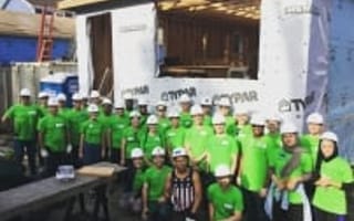 Neighborhoods.com Trades Laptops for Hammers with Habitat for Humanity
