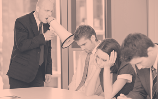 An orange-toned image of a man in a suit shouting over a bullhorn at three dejected employees. /investments-exits/investors-not-friends