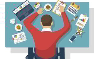 man sleeping at desk