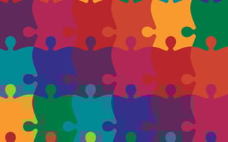 interlocking rainbow puzzle pieces inclusion concept