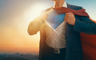 Superman revealing his true identity under his everyday clothing.