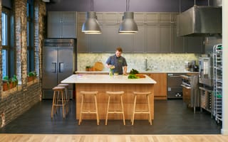 A chef prepares a new recipe in the Farmer's Fridge kitchen