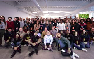 The Circulo team poses together in a large conference room.
