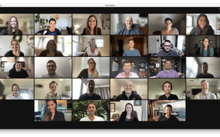 Employees gather in a video conference.