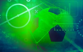 A soccer ball in a goal surrounded by sports analytics uncovering big data insights.