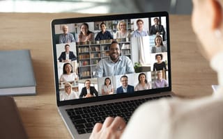 Employees gather in a video conference.