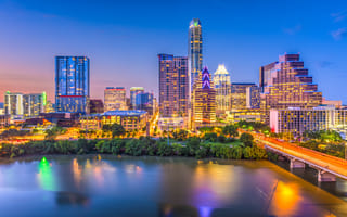 The Austin skyline illuminated at night.