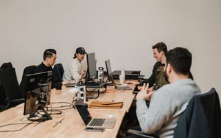 Simon employees brainstorming.