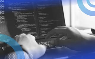 A software engineer's hands as they work on coding