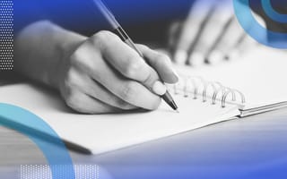A person writes longhand in a journal