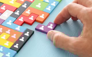 A puzzle representing multiple team members being rearranged.