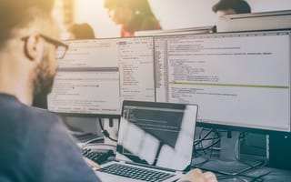 Programmer working in a software develop company office.