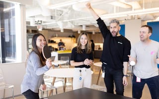 Slickdeals team members playing ping pong