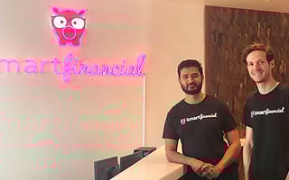 Two team members standing in the SmartFinancial front office