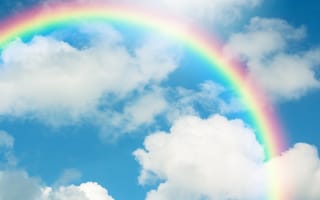 How to Find Your Dream Job in 2022 A rainbow and clouds against a blue sky