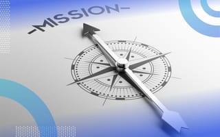 A compass points toward the word “mission.” /company-culture/3-reasons-mission-over-profit