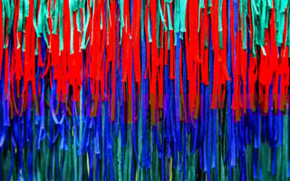 Strips of colorful cloth representing fringe benefits.
