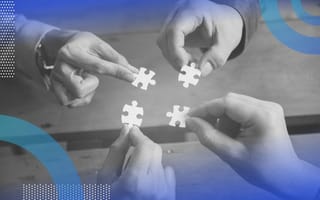 Four different hands hold matching puzzle pieces, close to bringing them together. /people-management/4-keys-relational-intelligence