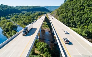 DAT equipment truck driving on the road